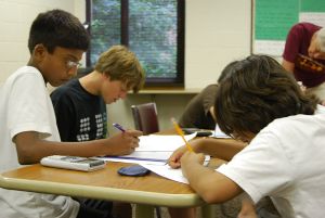 Teens working on math homework.